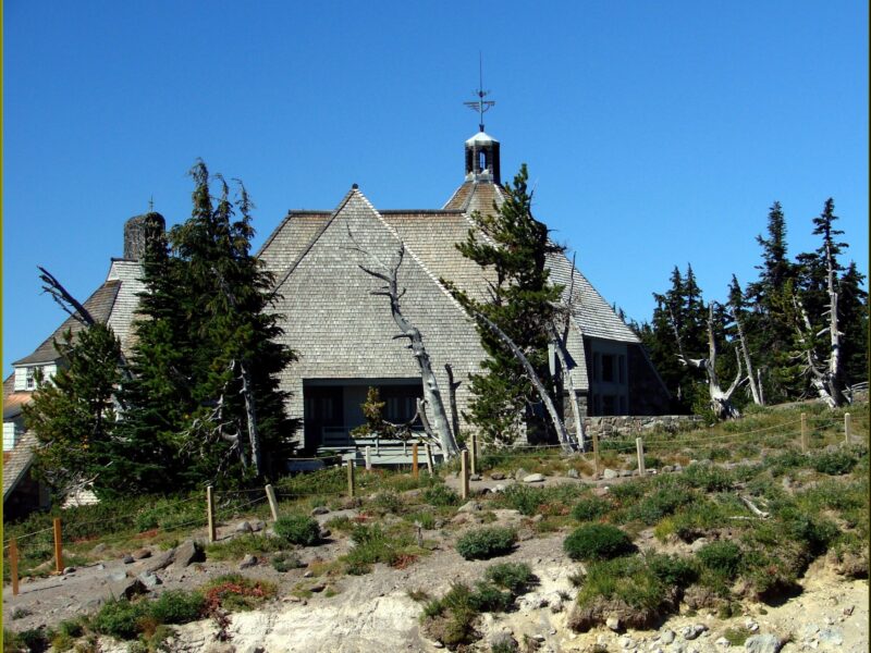 Timberline Lodge on Mount Hood, Oregon, with its shingled roof and bell tower among evergreen trees